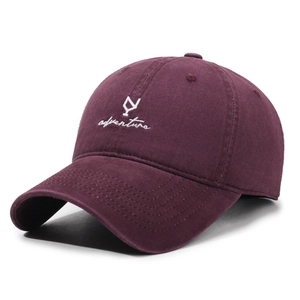 Vintage burgundy baseball cap with white adventure embroidery and curved brim for sun protection