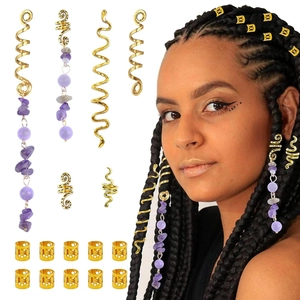 Golden spiral and cuff hair accessories with purple gemstone charms shown on a model
