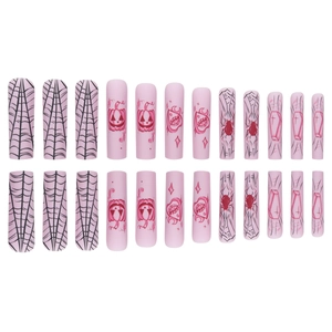 Long pink press on nails with Halloween pumpkin and spider web designs on white background