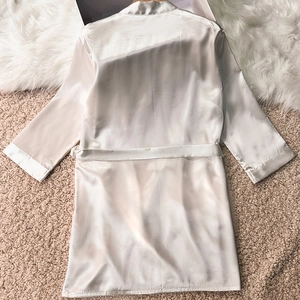 Champagne satin bathrobe with tie waist and silky finish for home relaxation