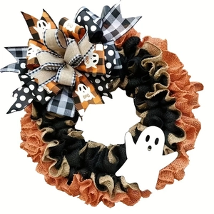Halloween wreath with orange burlap mesh ribbons, spooky ghost signs and large bow