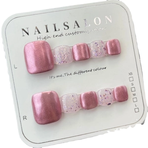 Pink cat eye and glitter press-on toenails set in a minimalist handmade design