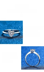 Detail view of heart-cut moissanite solitaire in S925 sterling silver multi-prong setting