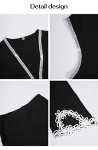 Détail du col en V et des poignets avec perles argentées et dentelle florale blanche sur noir