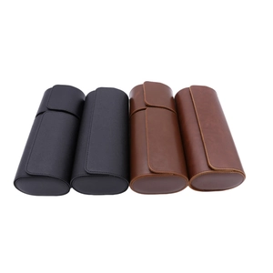 Detail showing high-quality black and brown PU leather cylindrical travel watch cases