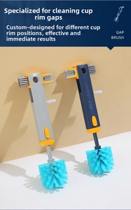 Detail view of the 4-in-1 gap cleaning brush featuring specialized bristles for lid crevices