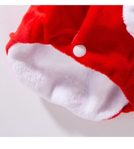 Detailed macro view of soft red velvet and white fleece texture with a secure snap button