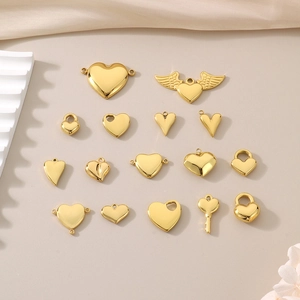 15 assorted golden stainless steel heart and angel wing pendants for DIY jewelry making