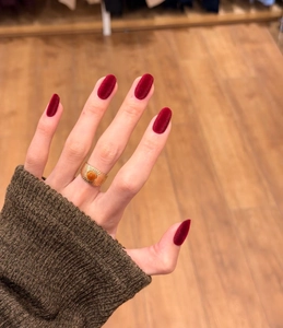 Macro detail of wine red velvet press-on nails with elegant matte texture for winter