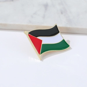 Detailed view of Palestine flag metal lapel pin with enamel finish and gold metal edges