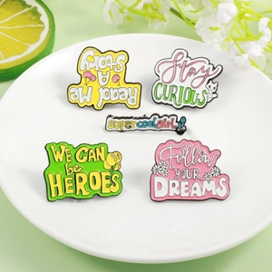 Five-piece cartoon enamel brooch set featuring inspirational quotes and cute cat motifs