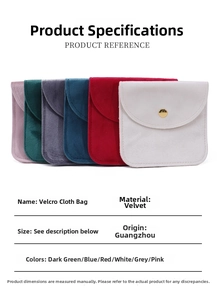 Detail view of colorful velvet jewelry pouches with snap closures and golden buttons
