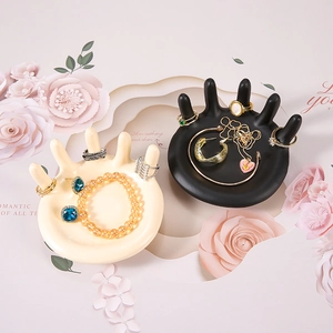 Nordic resin palm jewelry tray set in cream and matte black for ring and necklace display