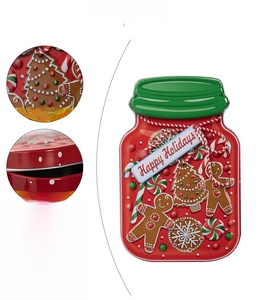 Detail of Christmas tinplate container showing texture, lid structure, and inner space