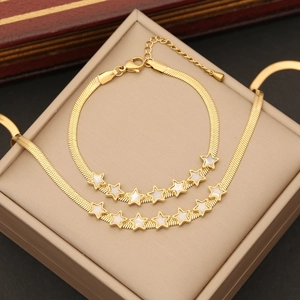 Gold star charm necklace and bracelet set in a gift box with flat snake chain