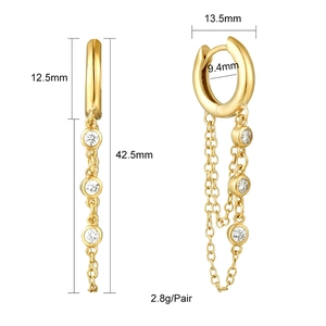 Detailed view of gold tassel earrings with zircon studs and precise size measurements