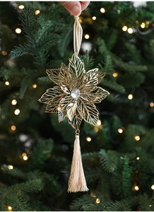 Golden hollow metal leaf Christmas ornament with crystal detail and beige tassel accent