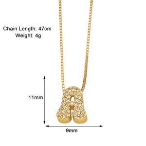 Detail view of 47cm gold necklace with zircon-inlaid letter A pendant and size specs