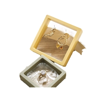 Présentoirs à bijoux flottants en film PE jaune et vert pour bagues et boucles