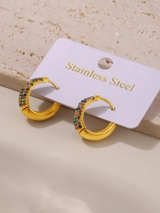 Detailed macro view of 18K gold plated stainless steel hoops with colorful zircons