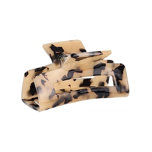 Elegant leopard print acetate hair claw clip with rectangular cutout in cream and brown