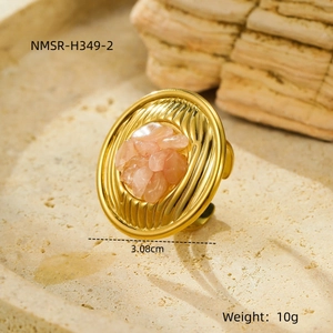 Detail of vintage gold textured ring with pink stones, diameter 3.08cm and weight 10g
