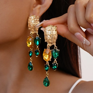 Vintage geometric drop earrings with gold texture, yellow stones and green crystal tassels
