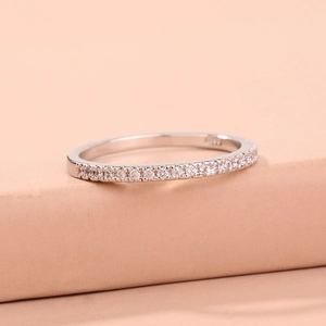 Close-up of S925 sterling silver ring featuring a half-circle of sparkling white zircons