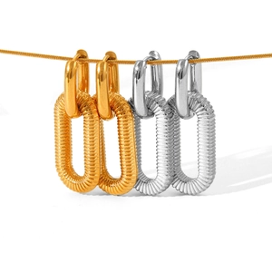 Textured U-shape stainless steel hoop earrings in gold and silver finish hanging on a chain