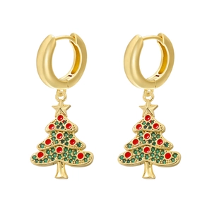 Close-up of golden hoop earrings featuring a colorful Christmas tree pendant design
