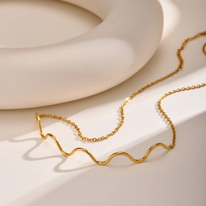Minimalist gold stainless steel water wave necklace with elegant geometric shadow
