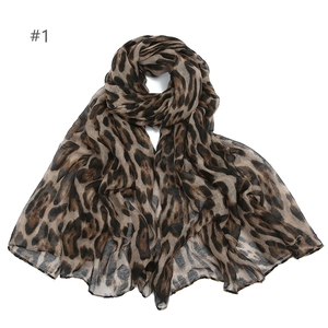 Lightweight leopard print chiffon scarf for women shown on a clean white background