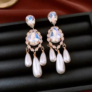 18k gold plated teardrop earrings with crystal stones and white hanging pearls