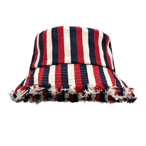 Detail of red and blue striped bucket hat featuring frayed edges and vintage texture