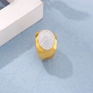 Top view of a gold oval titanium steel ring with micro-pave crystal rhinestones