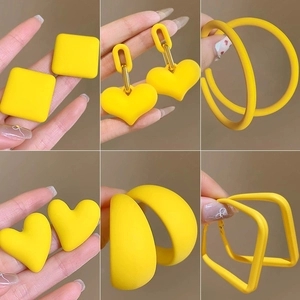 Elegant yellow acrylic geometric earrings in various shapes with matte frosted finish