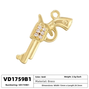 Detailed specs of a brass gold revolver pendant with dimensions and cubic zirconia inlay