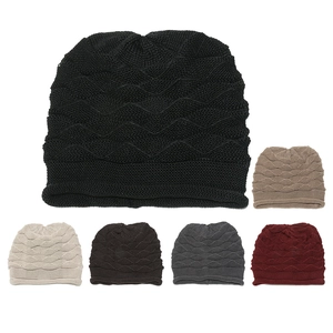 Detailed view of winter slouchy beanie featuring thick wave knit texture and six colors