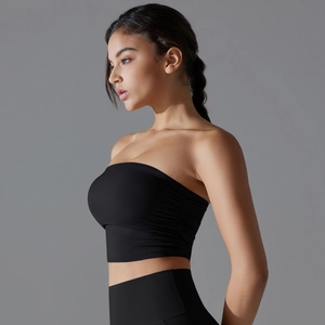 Detail view of the side drawstring ruching on a black strapless sports tube top
