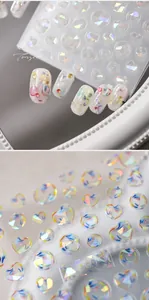 Detailed close-up of 3D holographic nail stickers featuring shell-like aurora glow effects