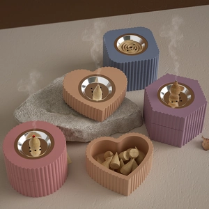 Pastel silicone incense burner set with heart and round shapes on stone texture