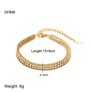 Close-up of double-row cubic zirconia settings and lobster clasp on gold steel bracelet