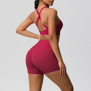 Detail of berry pink double-sided brushed sports bra and high-waisted shorts yoga set