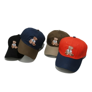 Cotton baseball caps with teddy bear embroidery in various multi-color combinations