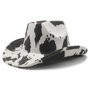 Detail of western cow print cowboy hat showing white stitching and suede texture