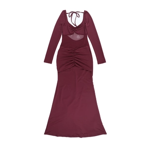 Detail of wine red maxi dress featuring sheer waist cut-outs and pleated bodice design