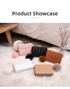 Quilted small wallets with decorative studs and pompom zipper pulls in five colors