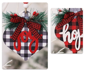 Detail of wooden buffalo plaid Christmas ornaments with 3D Joy and Hope lettering and pine accents
