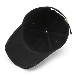 Distressed black cotton baseball cap with vintage ripped details and metal buckle adjustment