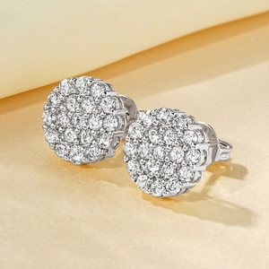 Macro shot of sparkling round cubic zirconia stud earrings with a silver-tone setting
